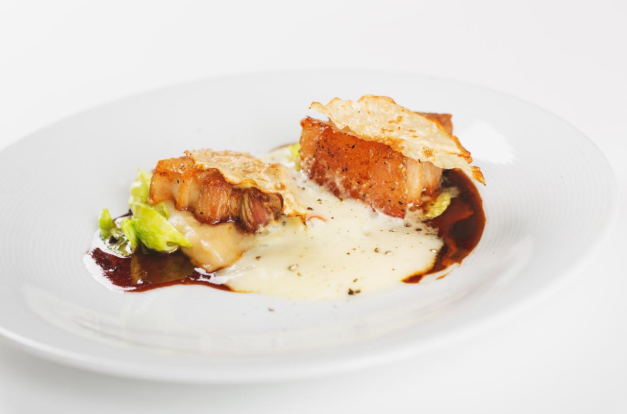 Retro Riverside Wellness Resort Karlsbad Exterior foto A prepared dish of monkfish